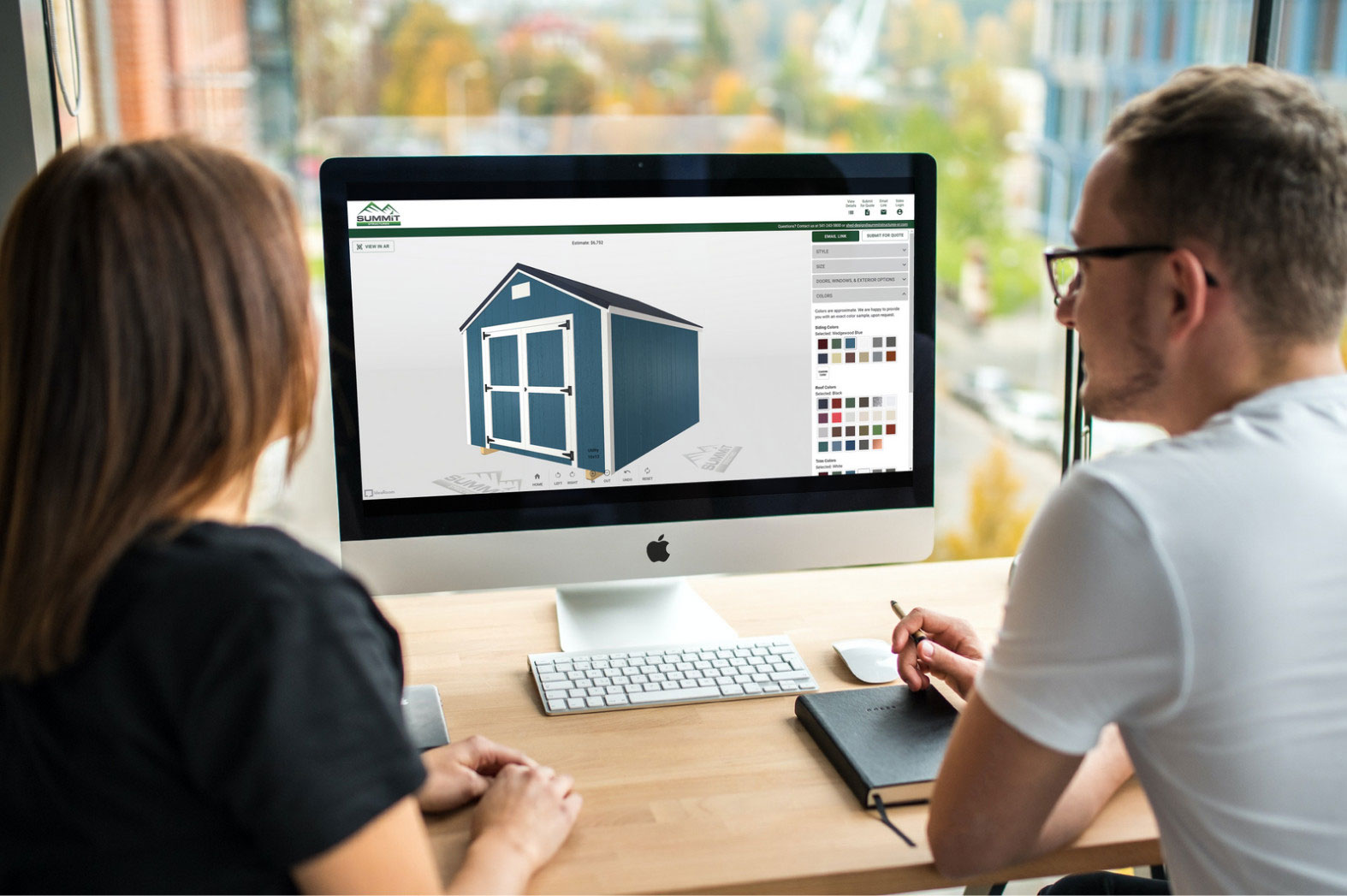 A couple using the Summit Structures online 3D shed design tool