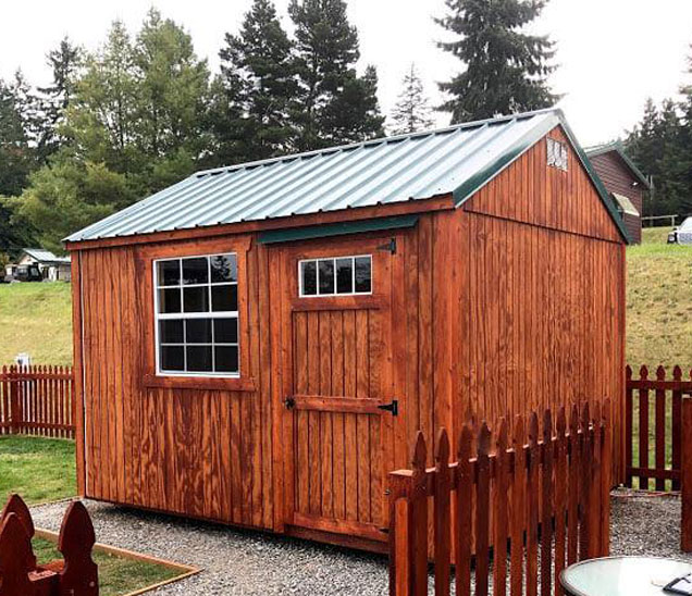 stained wooden utility shed