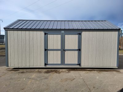 A 10x20 Utility Shed with a black door.