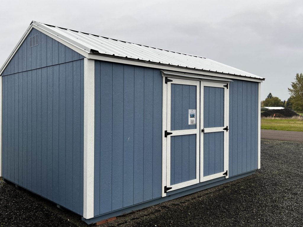 blue basic shed on lot
